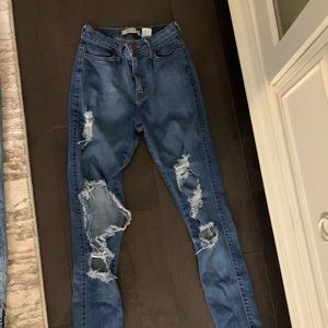 high waisted destroyed medium wash skinny jeans